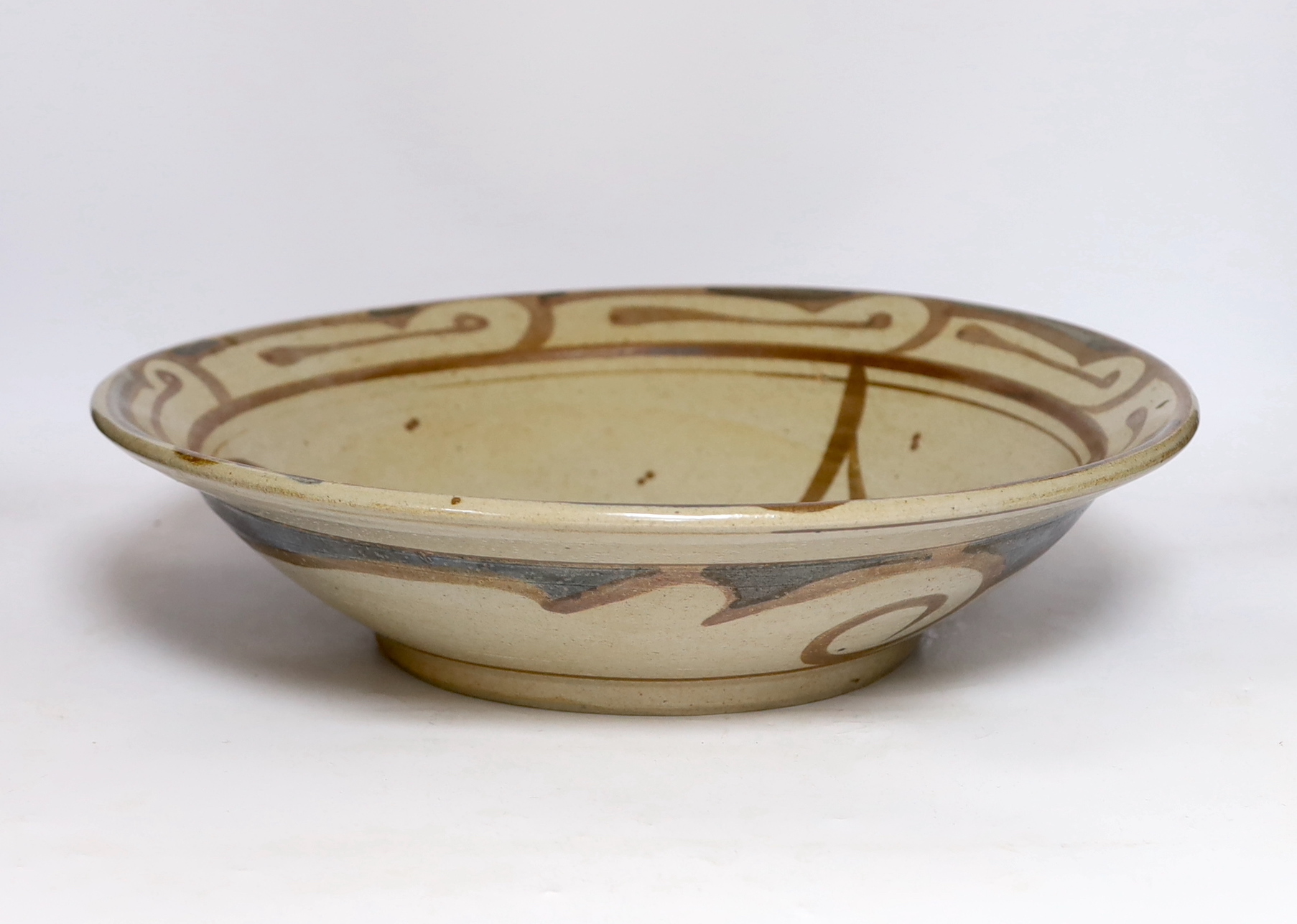 Svend Bayer, (b.1946), a studio pottery stoneware bowl with a stylised bird decoration, 44cm